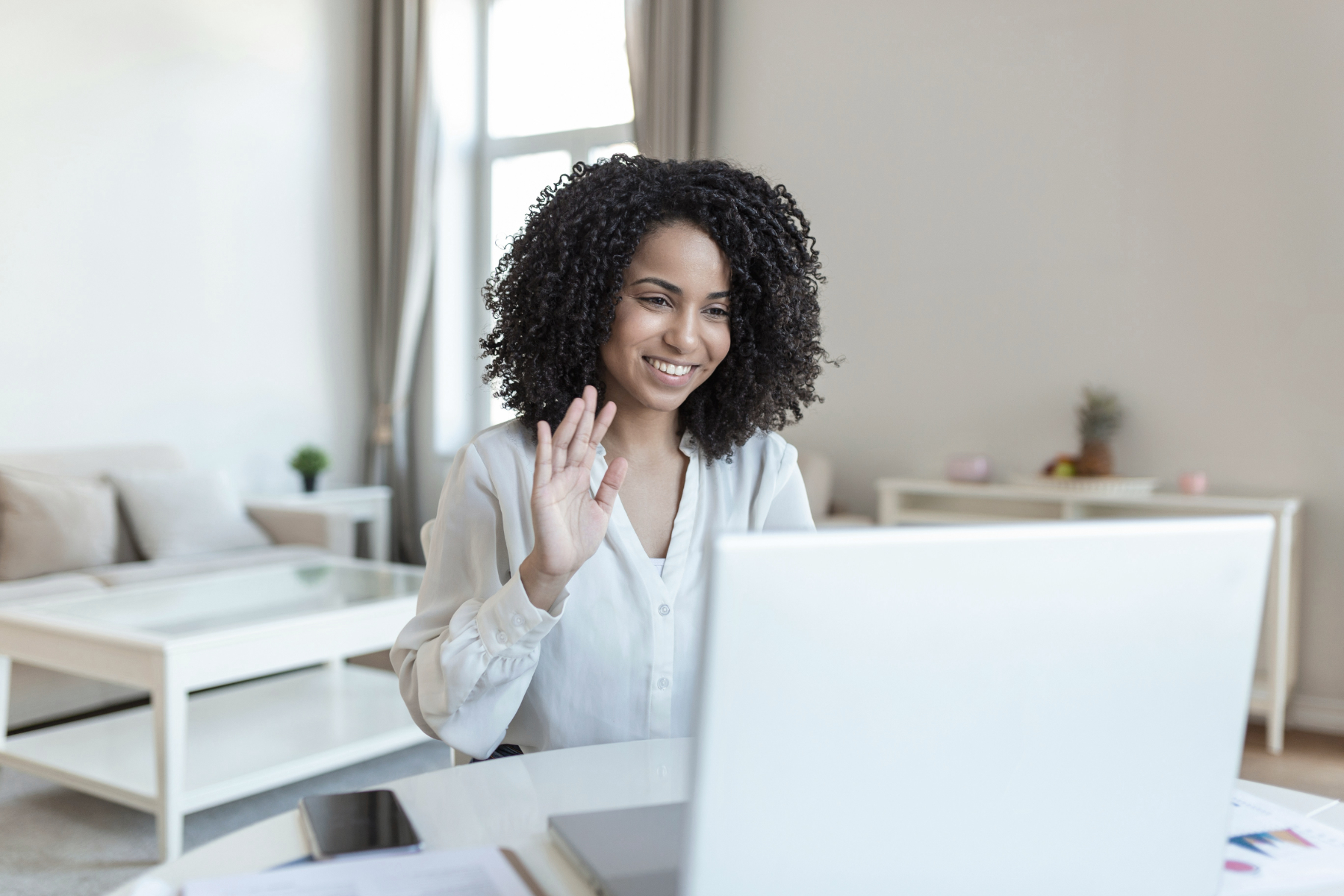 Women smiling at a computer screen on AccountMakers the Contingent W2 staffing platform