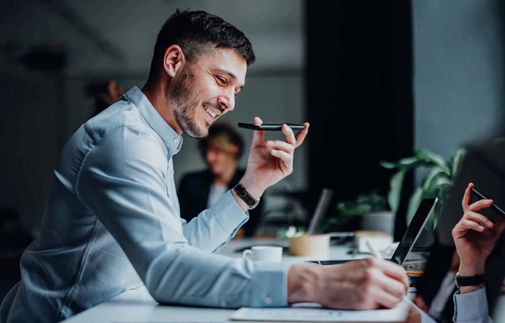 Ambitious sales professional reviewing performance results in a modern office, symbolizing high-earning sales career paths.