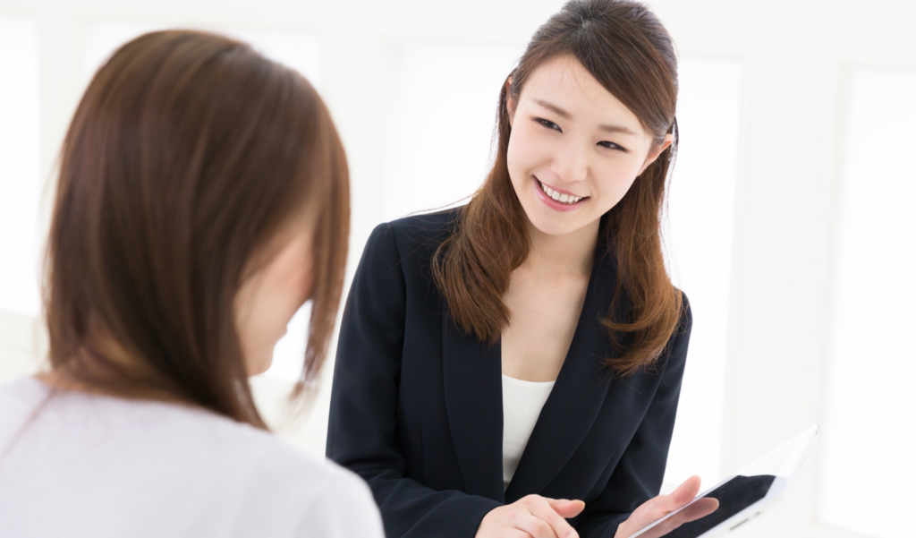 Temp Customer Success Staffing - image of temp customer success employee talking with coworker