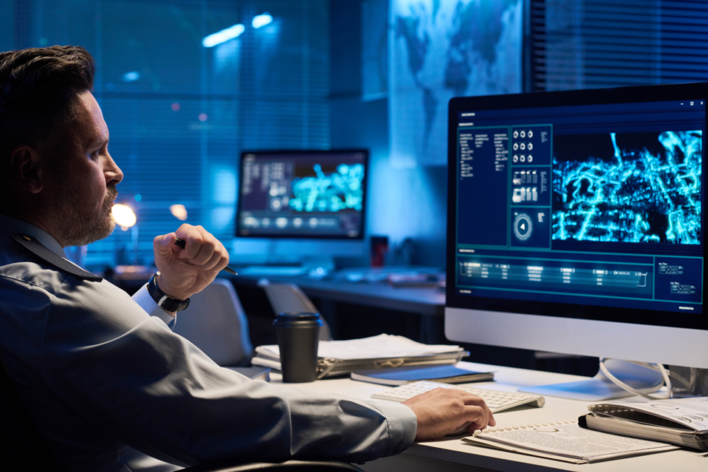 Temporary Support Hiring - image of temporary support specialist sitting at desk working on project with AI