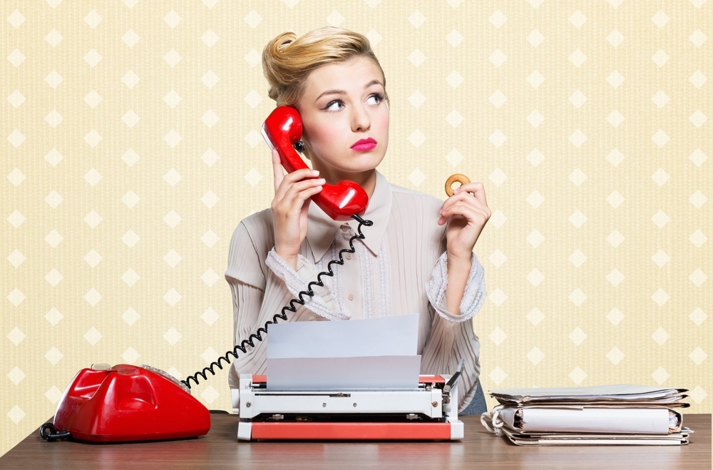 photo of sales rep on an old phone